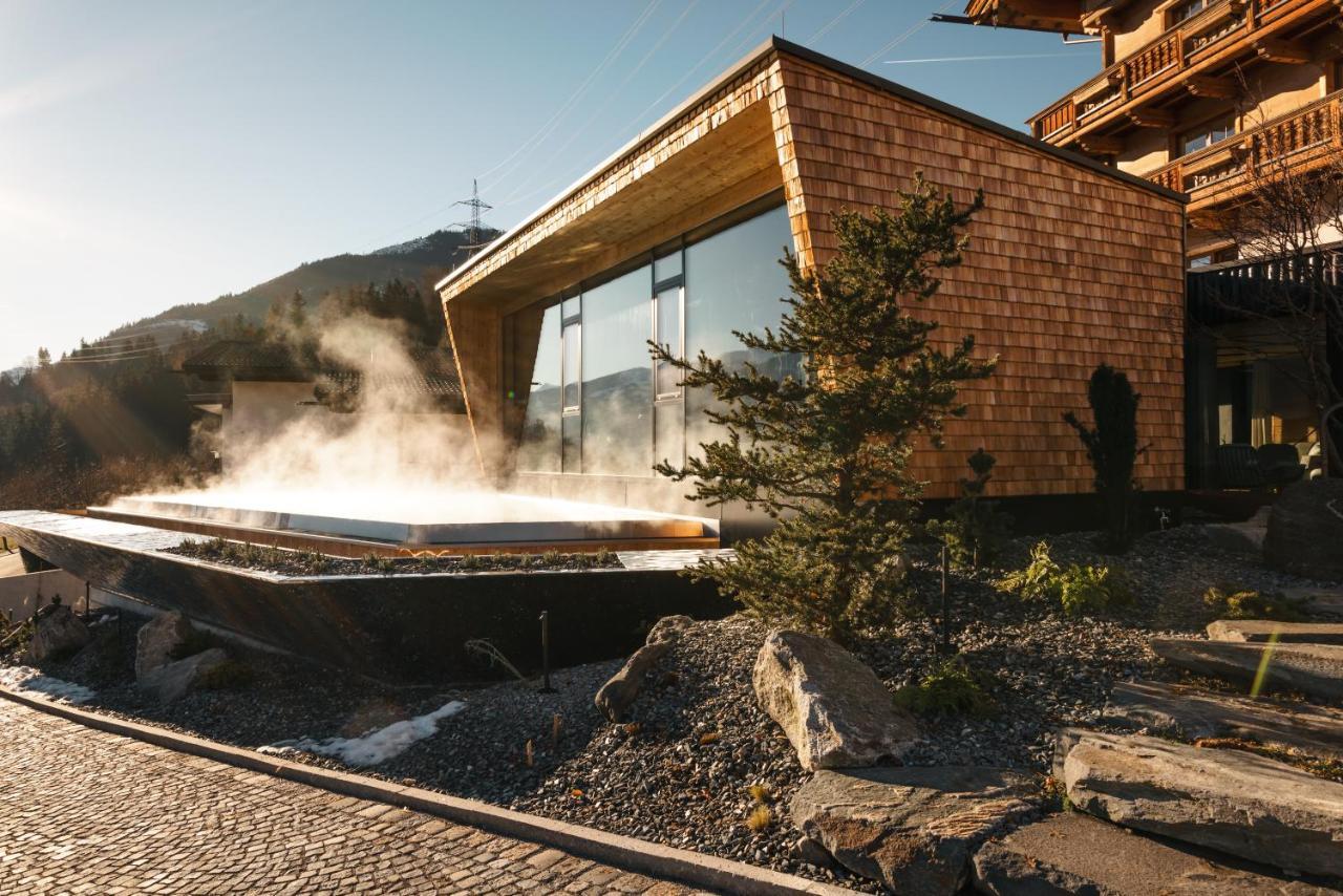 Aster Boutique Hotel & Chalets Fuegenberg Extérieur photo