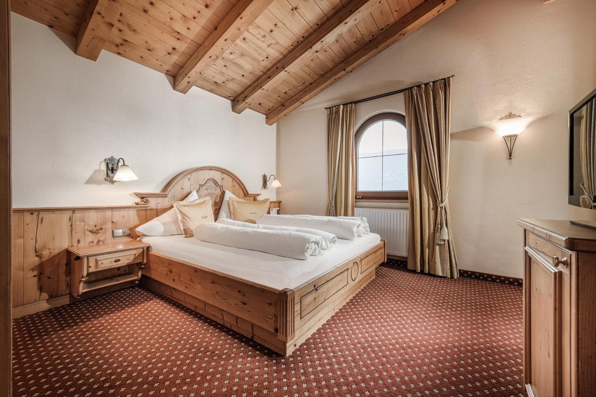 Aster Boutique Hotel & Chalets Fuegenberg Chambre photo